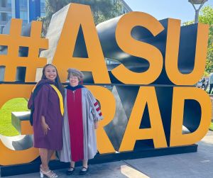 Photo of Ilani and Karin by the ASU Grad sign