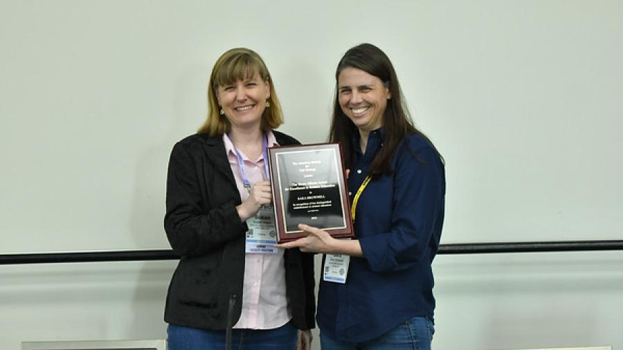 Photo of Sara Brownell receiving award