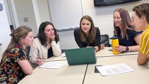 Photo of Kately Cooper and her lab group