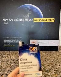 Photo of Dina's conference badge