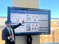 Akaash Surendra presenting his eposter at AAAS 2025