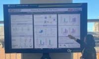 Photo of Fathima Nawaz presenting her eposter at AAAS 2025