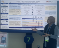 Photo of Tasneem Mohammed presenting her eposter at AAAS 2025